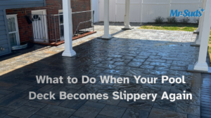Professional soft washing a slippery concrete pool deck in Hartford CT to remove algae, biofilm, and restore safe, non-slip traction around the swimming pool.