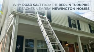 Berlin Turnpike road salt leaving a gray film on Newington home siding
