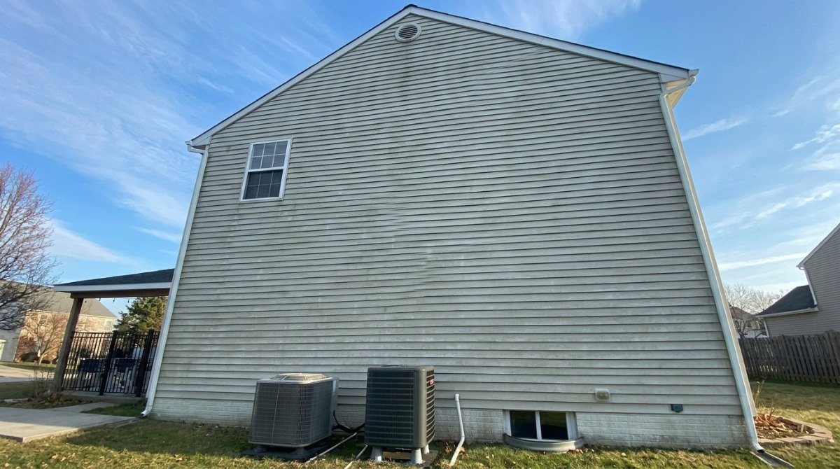 Yellow pine pollen collecting on house siding and outdoor furniture in Hartford County